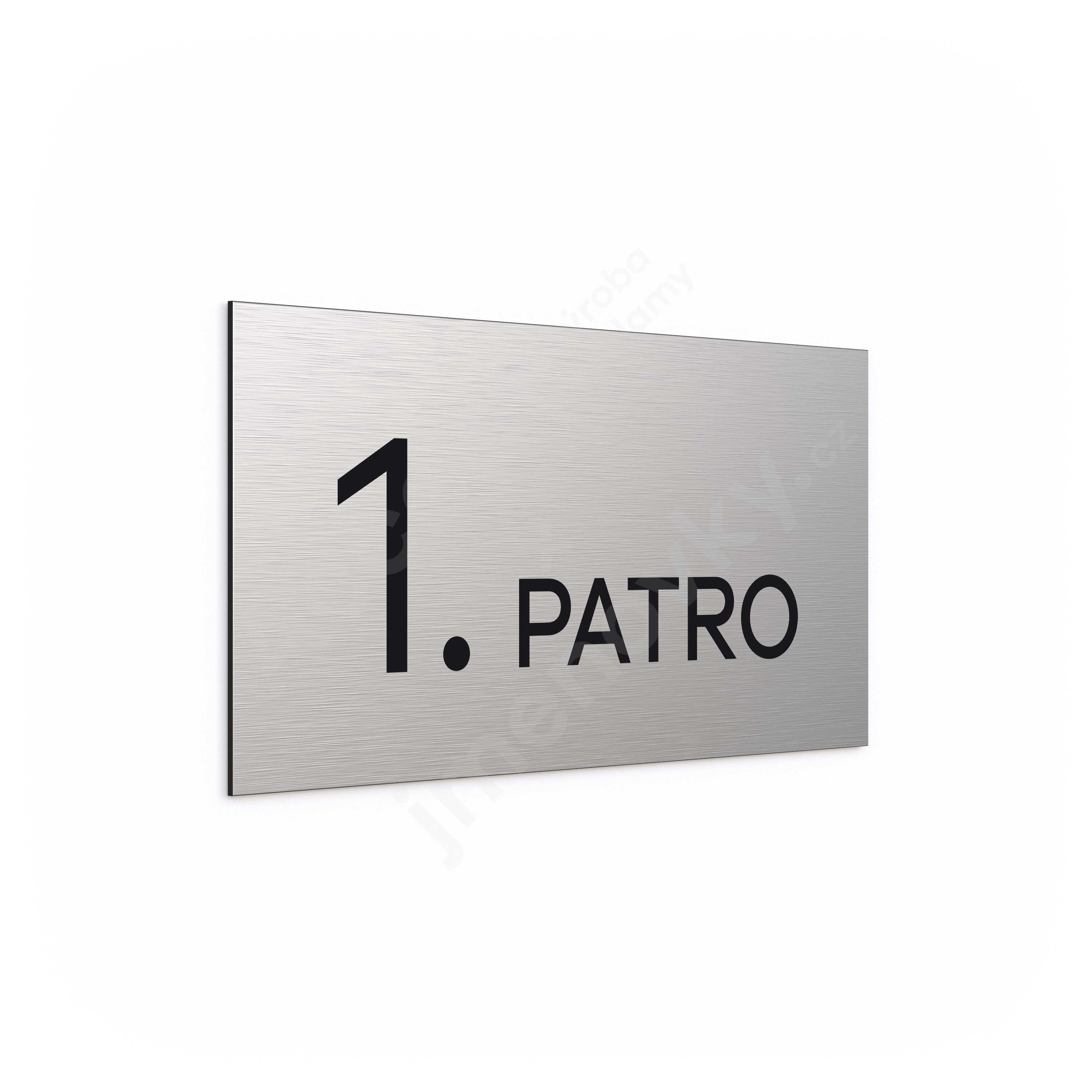 Označení podlaží "1. PATRO" - stříbrná tabulka - černý popis