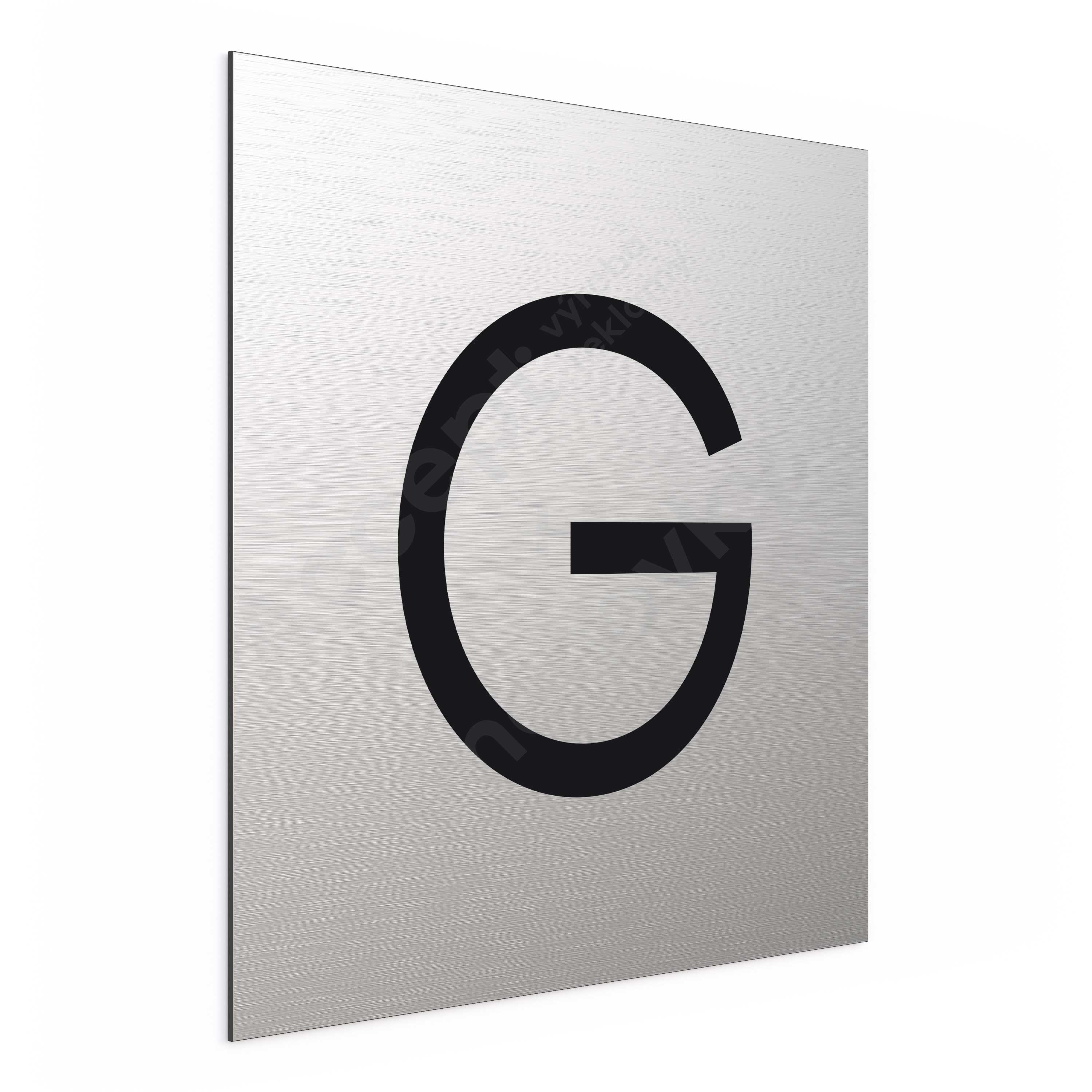 Označení podlaží - písmeno "G" - stříbrná tabulka - černý popis
