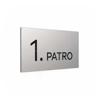 Označení podlaží "1. PATRO" - stříbrná tabulka - černý popis