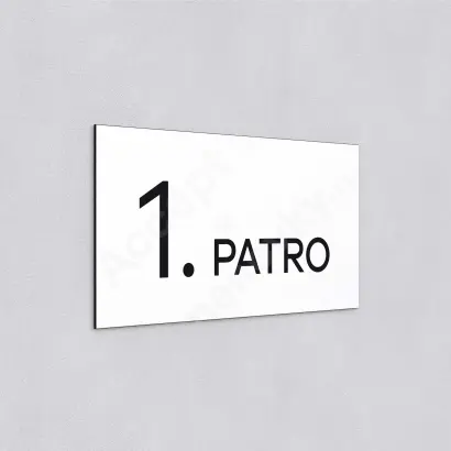 Označení podlaží "1. PATRO" - bílá tabulka - černý popis