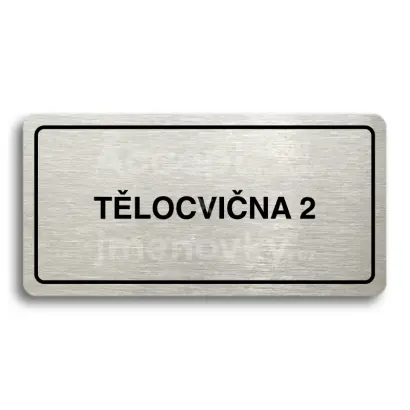 Piktogram “TĚLOCVIČNA 2" - stříbrná tabulka - černý tisk