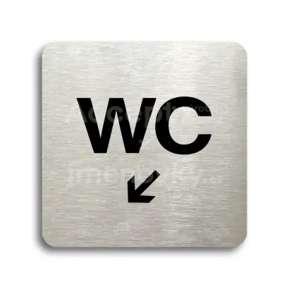 Piktogram "WC vlevo dolů" - stříbrná tabulka - černý tisk bez rámečku