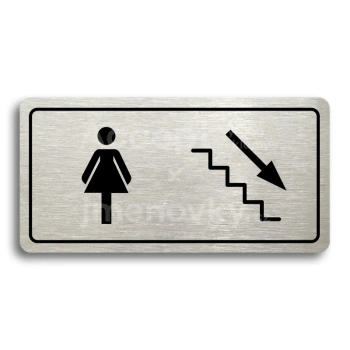 Piktogram "WC ŽENY VPRAVO DOLŮ" - stříbrná tabulka - černý tisk